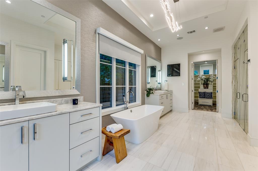 4326 Pomona Road Dallas, TX 75209 - Photo 16 of 31 Full bath featuring recessed lighting, two vanities, a freestanding tub, and a stall shower