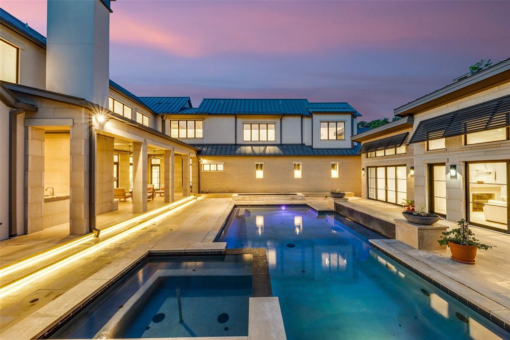 4326 Pomona Road Dallas, TX 75209 - Photo 27 of 31 Pool at dusk with a patio area, a pool with connected hot tub, and french doors