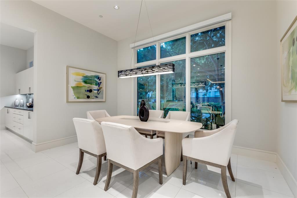 4326 Pomona Road Dallas, TX 75209 - Photo 6 of 31 Dining space featuring baseboards and light tile patterned floors