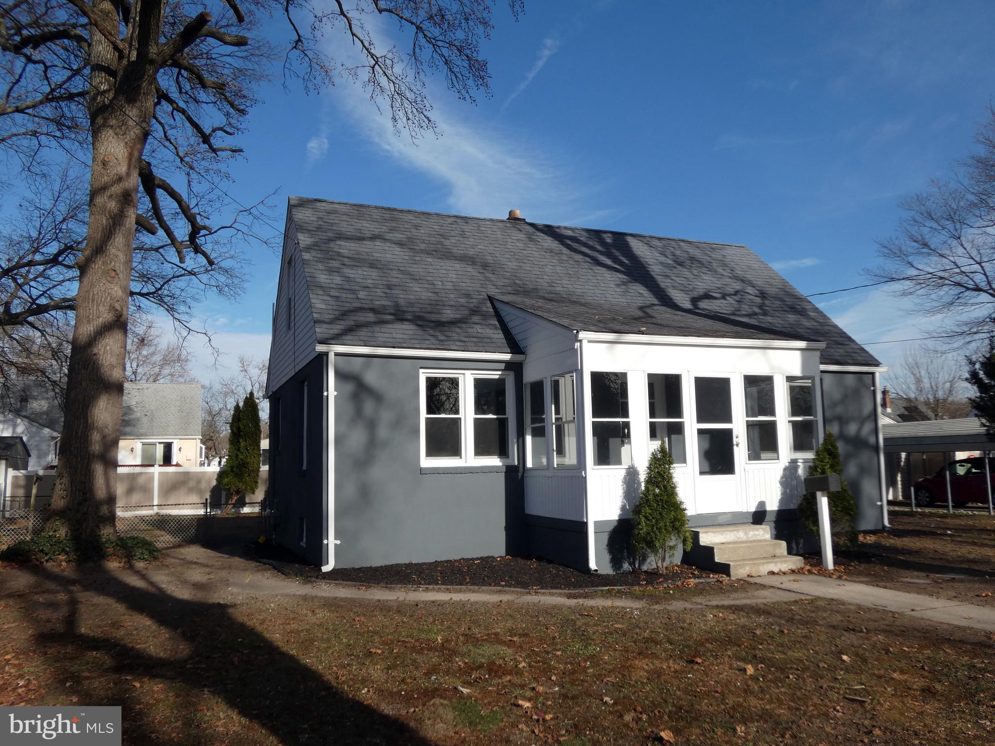 411 Manor Avenue Carneys Point, NJ 08069 - Photo 1 of 50 a view of a house with a patio