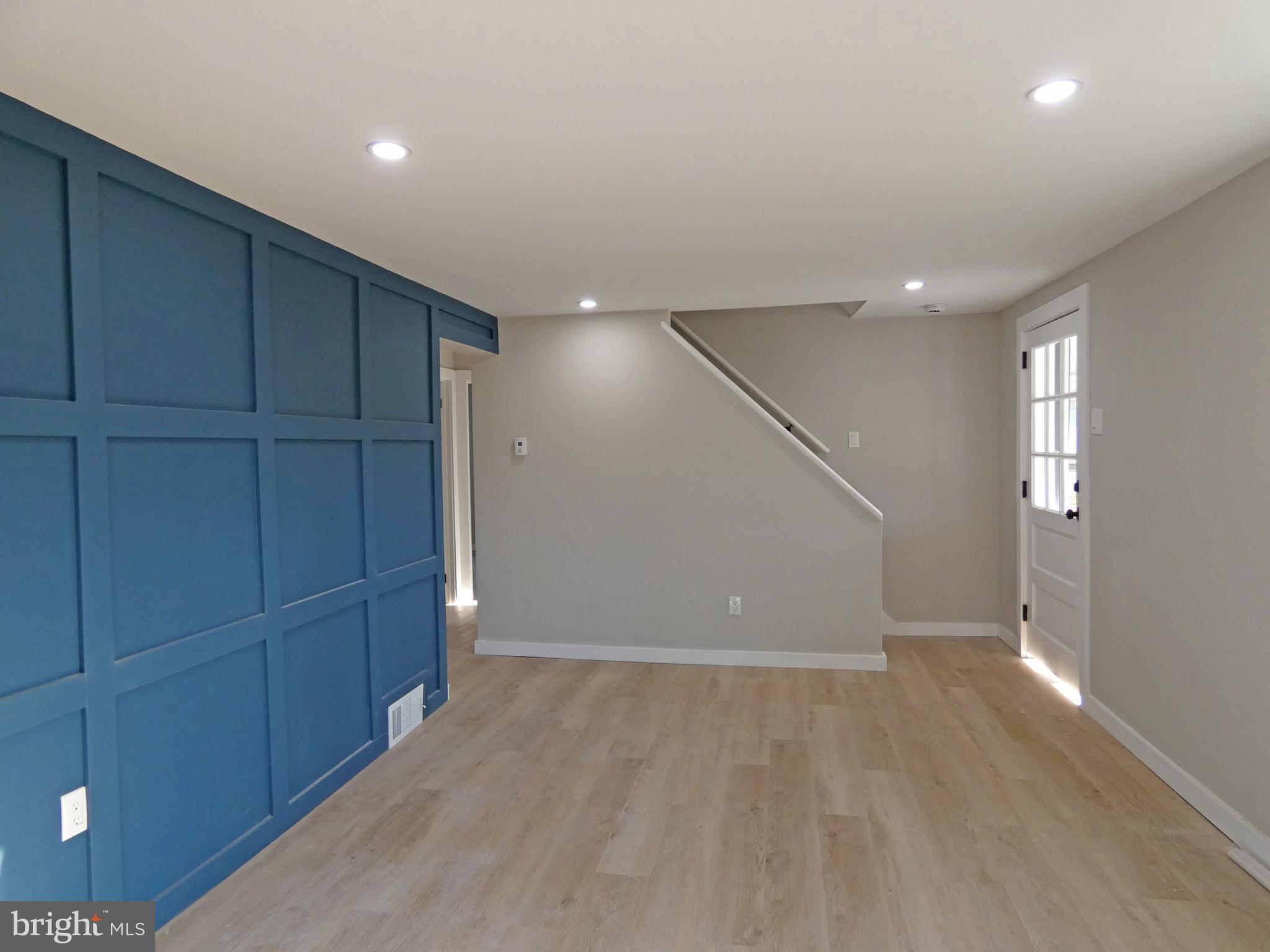 411 Manor Avenue Carneys Point, NJ 08069 - Photo 12 of 50 a view of an empty room with wooden floor