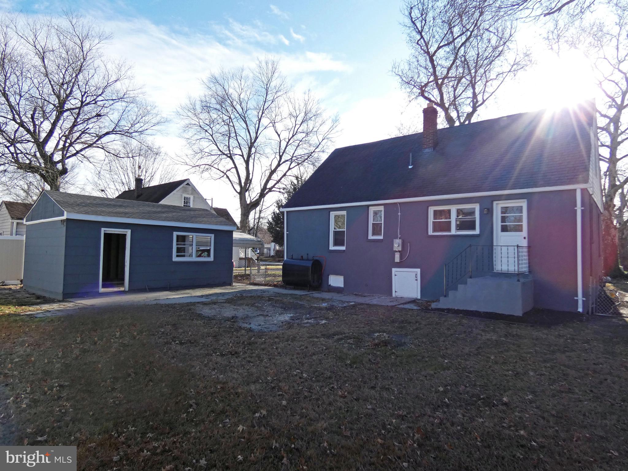 411 Manor Avenue Carneys Point, NJ 08069 - Photo 48 of 50 a view of a yard in front of a house