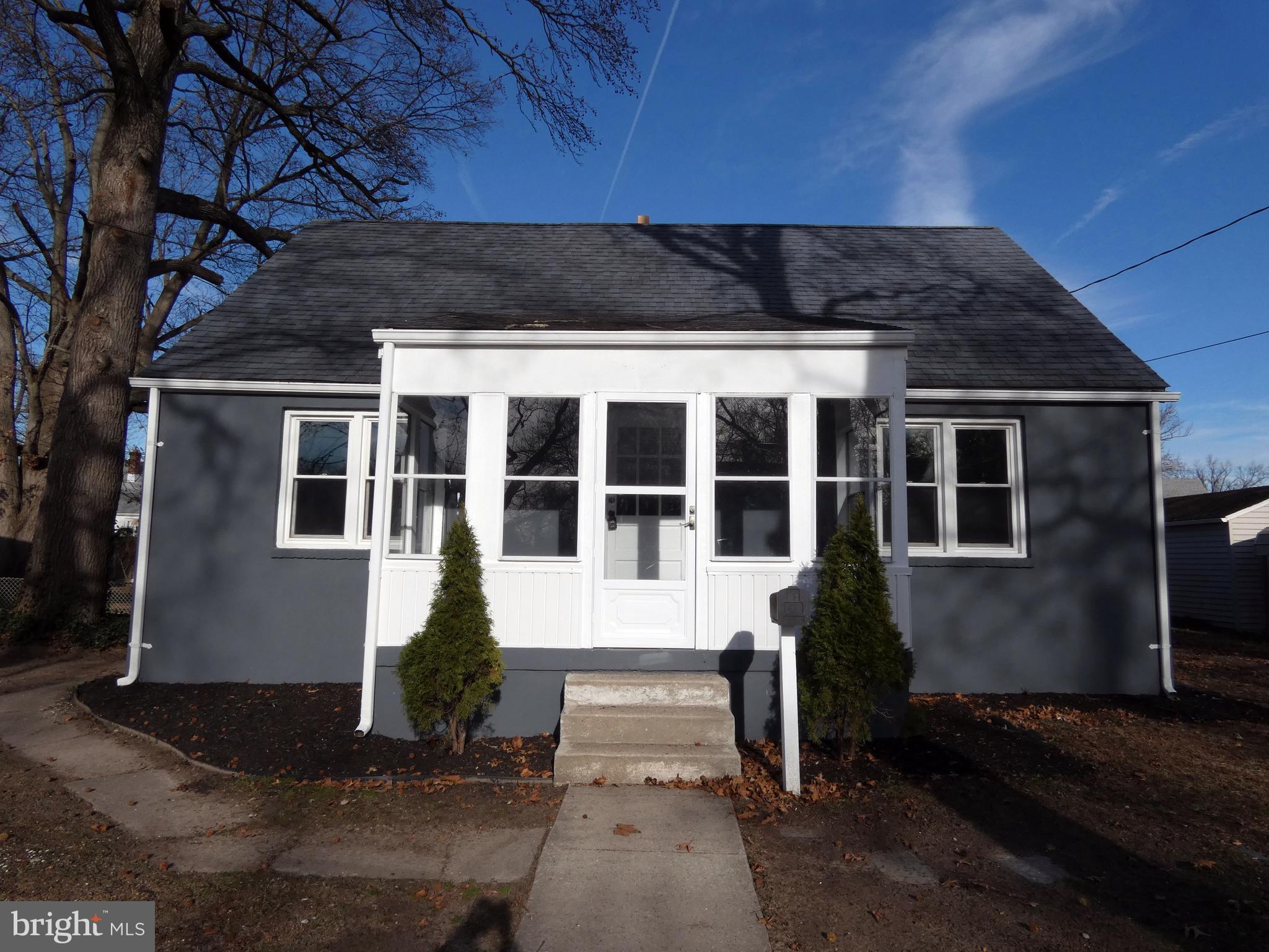 411 Manor Avenue Carneys Point, NJ 08069 - Photo 6 of 50 a front view of a house with windows