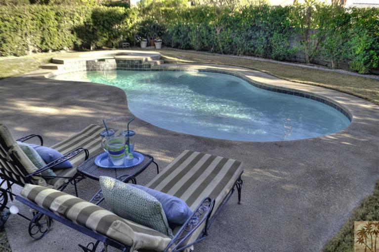 68249 Risueno Road Cathedral City, CA 92234 - Photo 34 of 41 a view of a patio with swimming pool