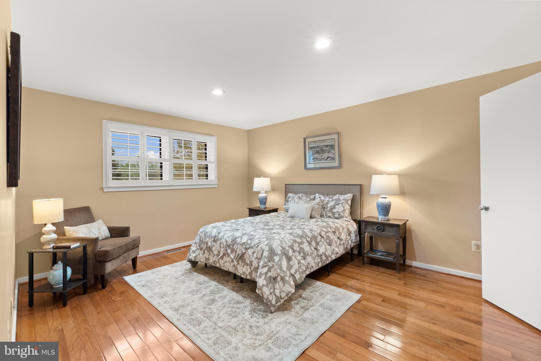 6315 Manchester Way Alexandria, VA 22312 - Photo 33 of 51 a bedroom with a bed and wooden floor