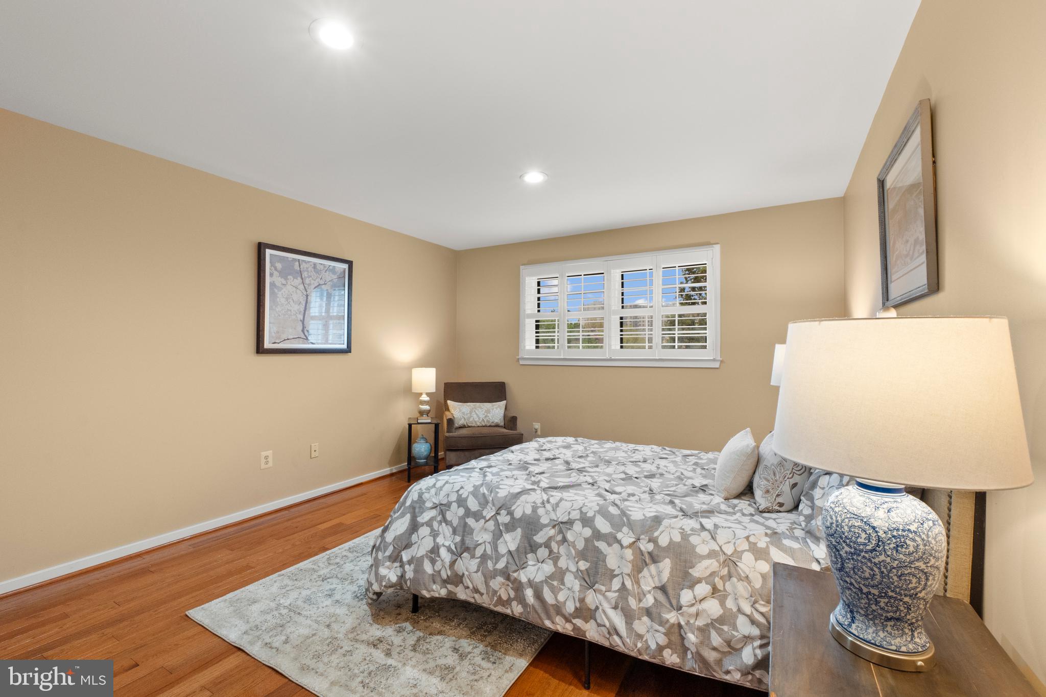 6315 Manchester Way Alexandria, VA 22312 - Photo 34 of 51 a bedroom with a bed and wooden floor
