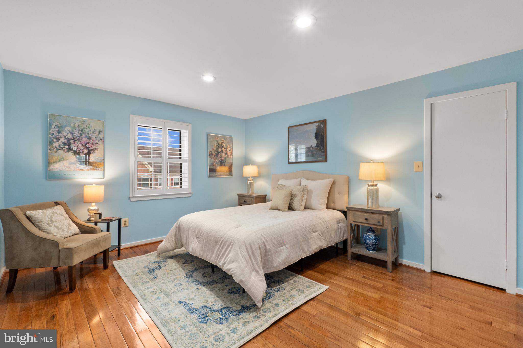 6315 Manchester Way Alexandria, VA 22312 - Photo 36 of 51 a bedroom with a bed and wooden floor