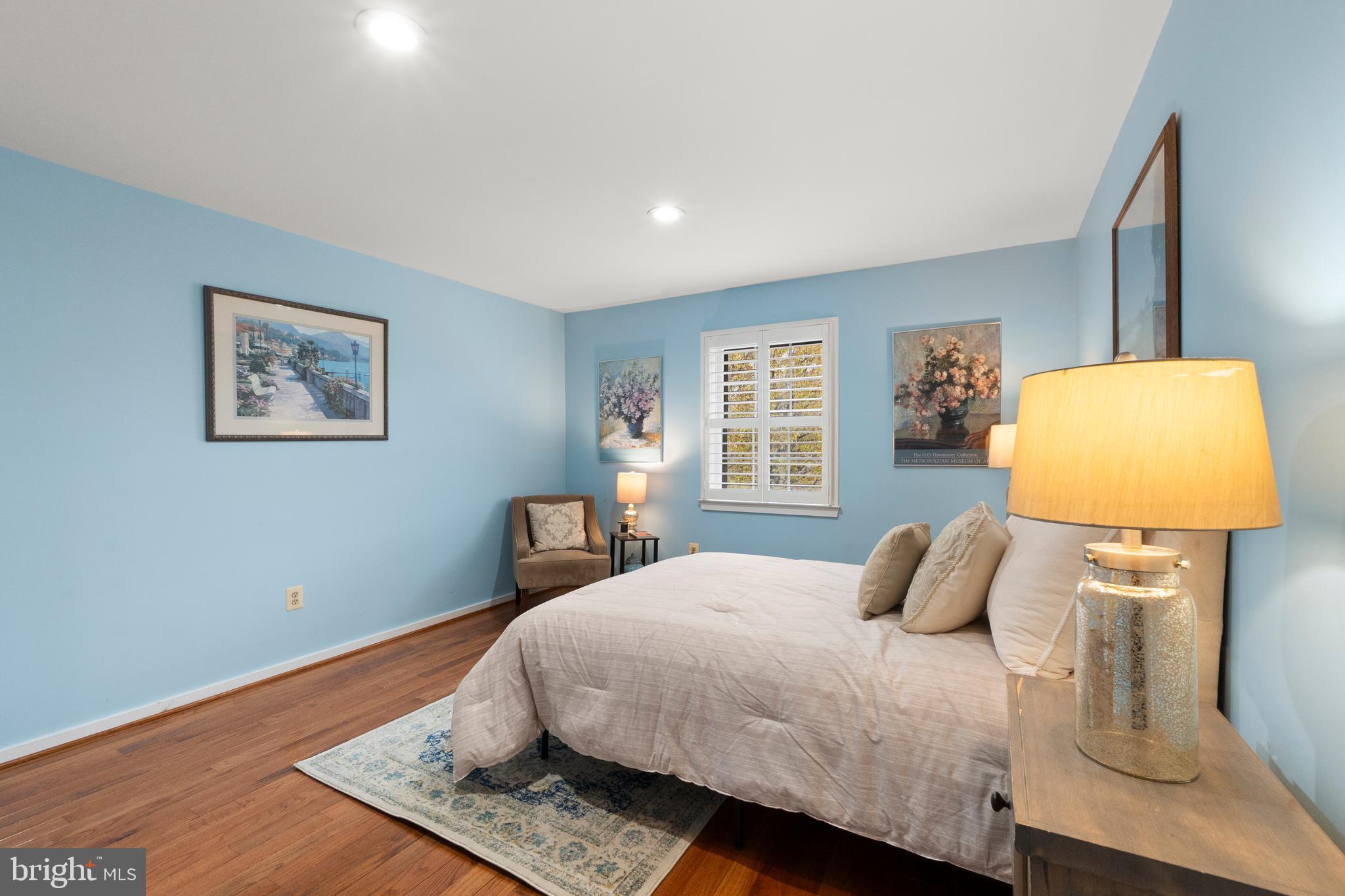 6315 Manchester Way Alexandria, VA 22312 - Photo 37 of 51 a bedroom with a bed and wooden floor