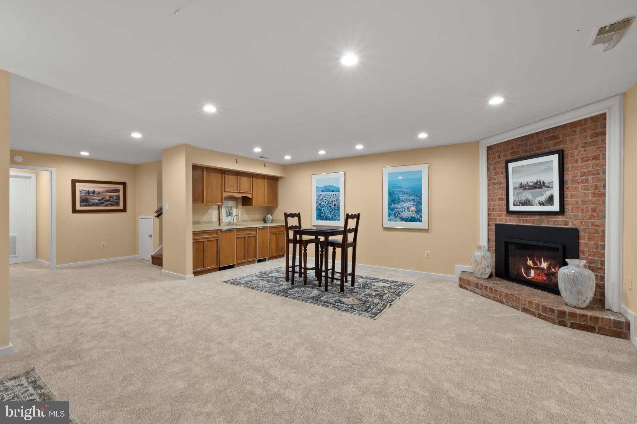 6315 Manchester Way Alexandria, VA 22312 - Photo 40 of 51 a view of a livingroom with furniture and a fireplace