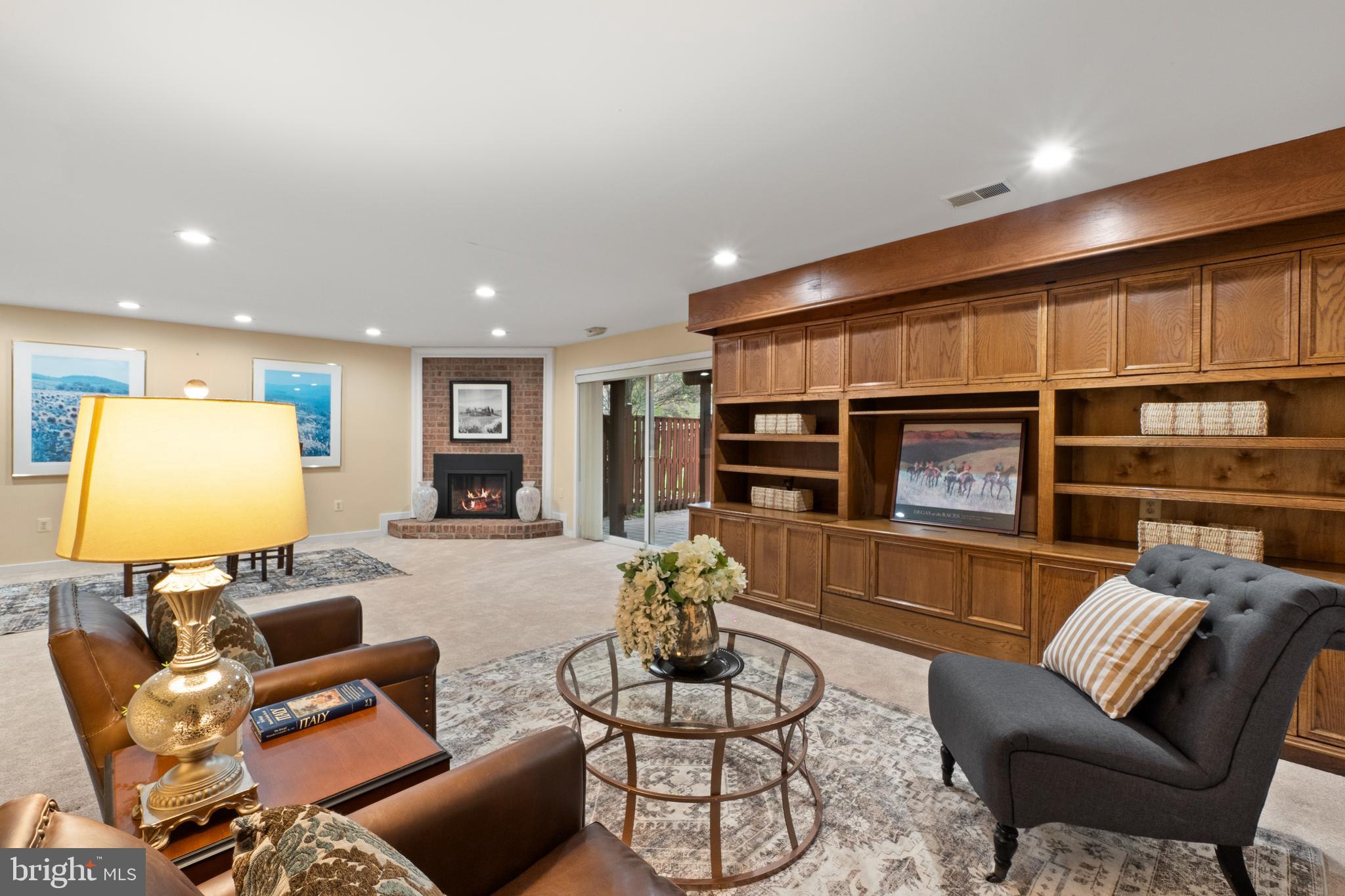 6315 Manchester Way Alexandria, VA 22312 - Photo 41 of 51 a living room with furniture and a flat screen tv