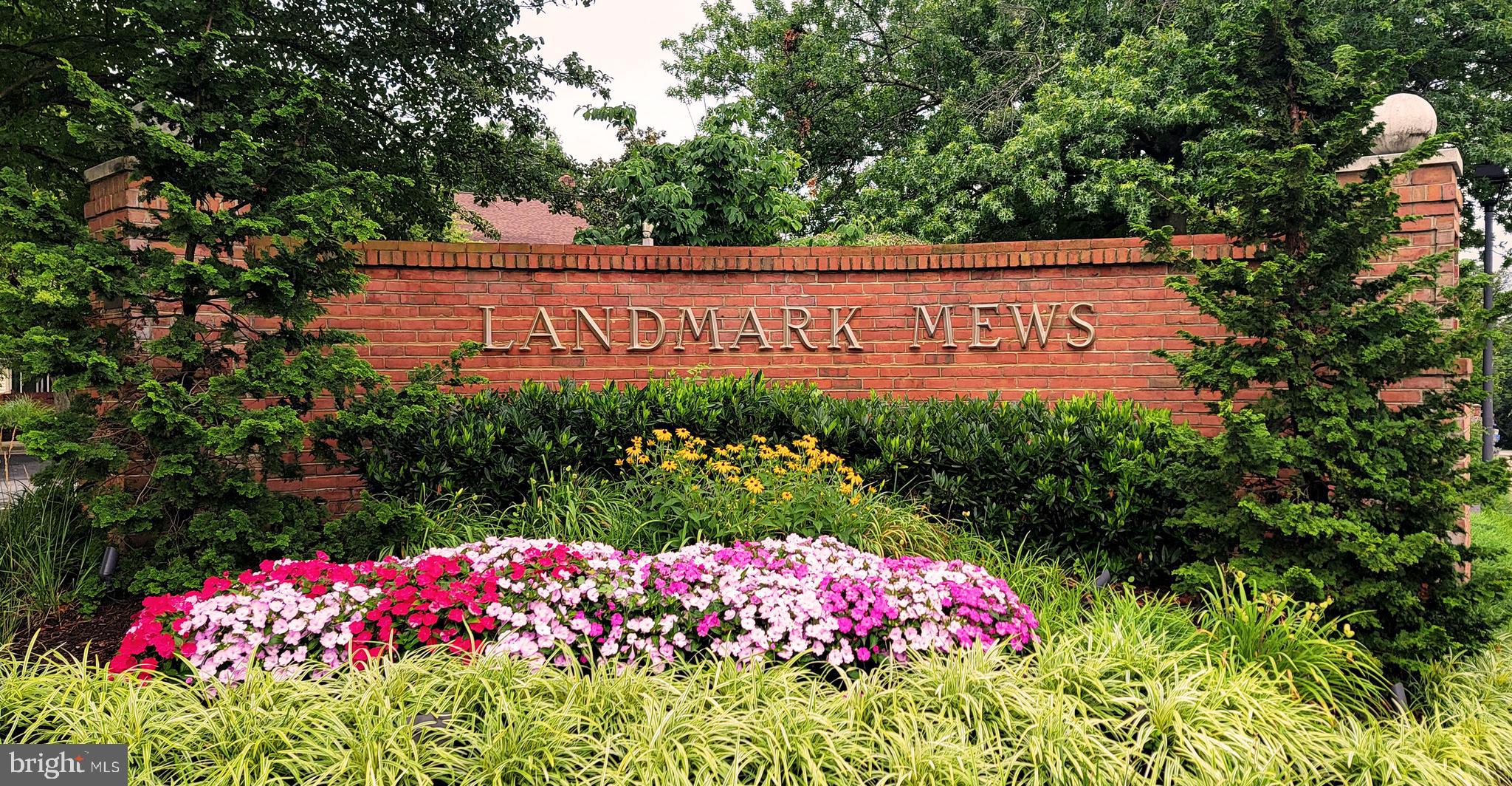 6315 Manchester Way Alexandria, VA 22312 - Photo 44 of 51 a sign that is sitting in front of flowers