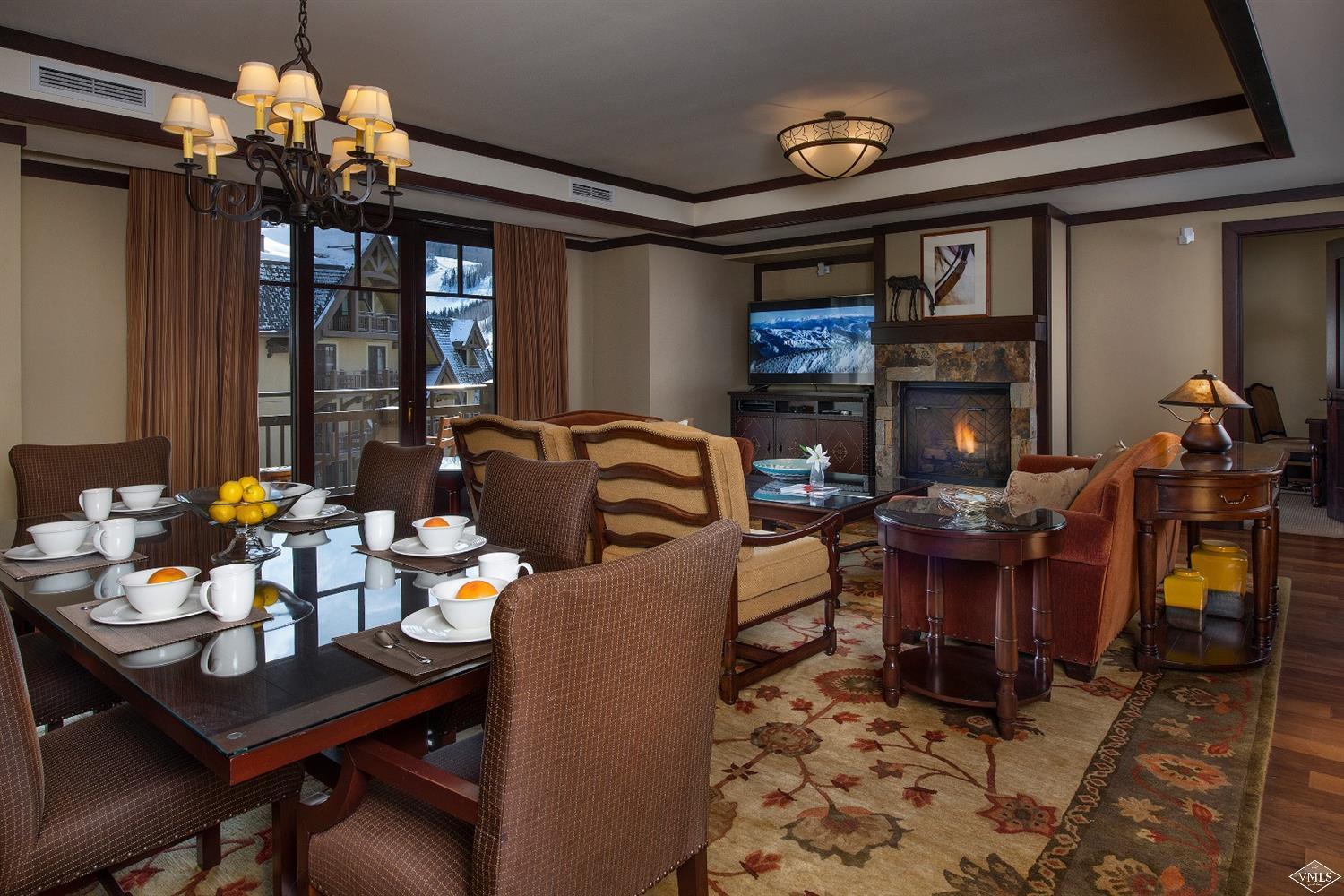 1 Vail Road, Unit 6101 Vail, CO 81657 - Photo 5 of 23 a view of a dining room with furniture window and outside view