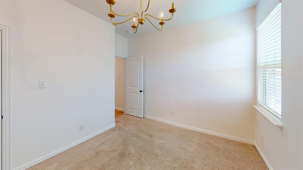 749 Twinvale Drive Princeton, TX 75407 - Photo 9 of 23 an empty room with windows