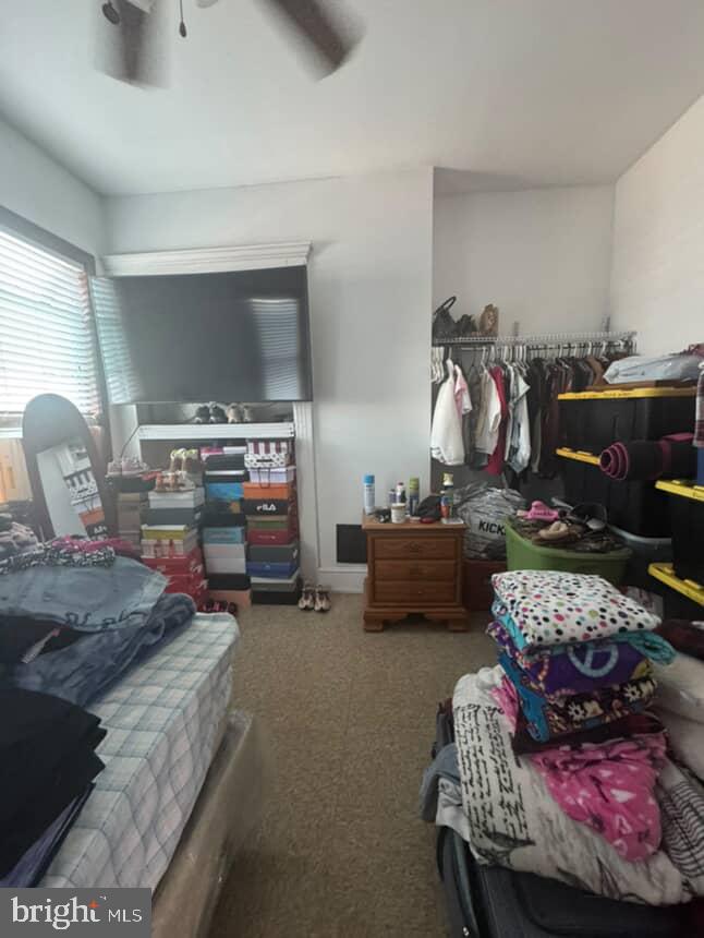 3028 North 4th Street Philadelphia, PA 19133 - Photo 14 of 15 a living room with furniture and a flat screen tv