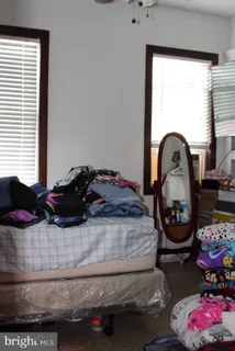 a living room with furniture and a gate