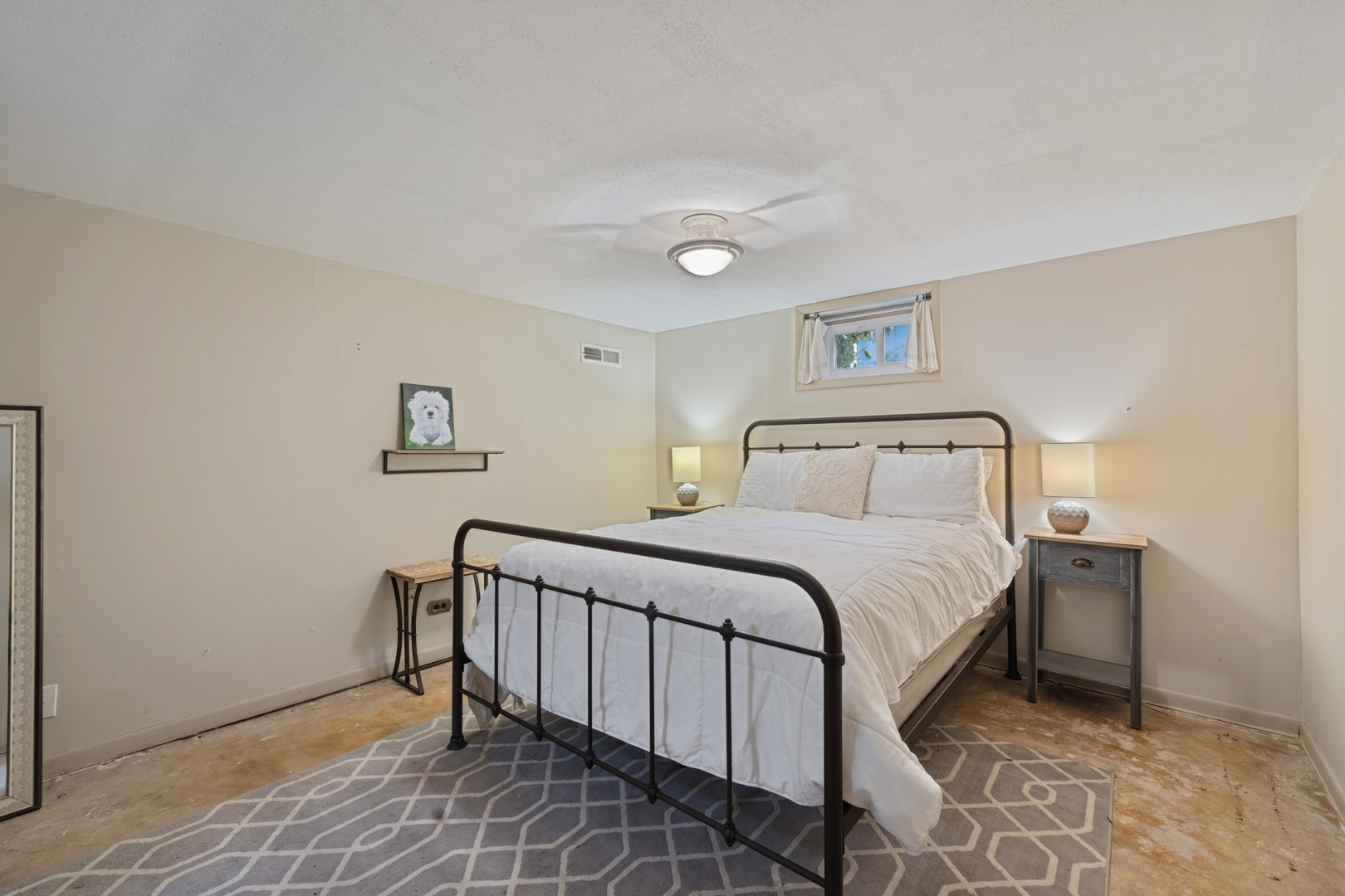 151 Walton Street Barrington, IL 60010 - Photo 17 of 22 a bedroom with a bed and a night stand