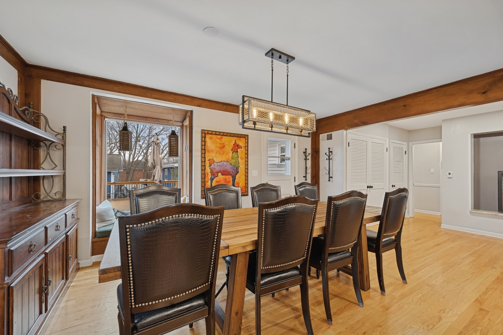151 Walton Street Barrington, IL 60010 - Photo 8 of 22 a view of a dining room with furniture window and wooden floor