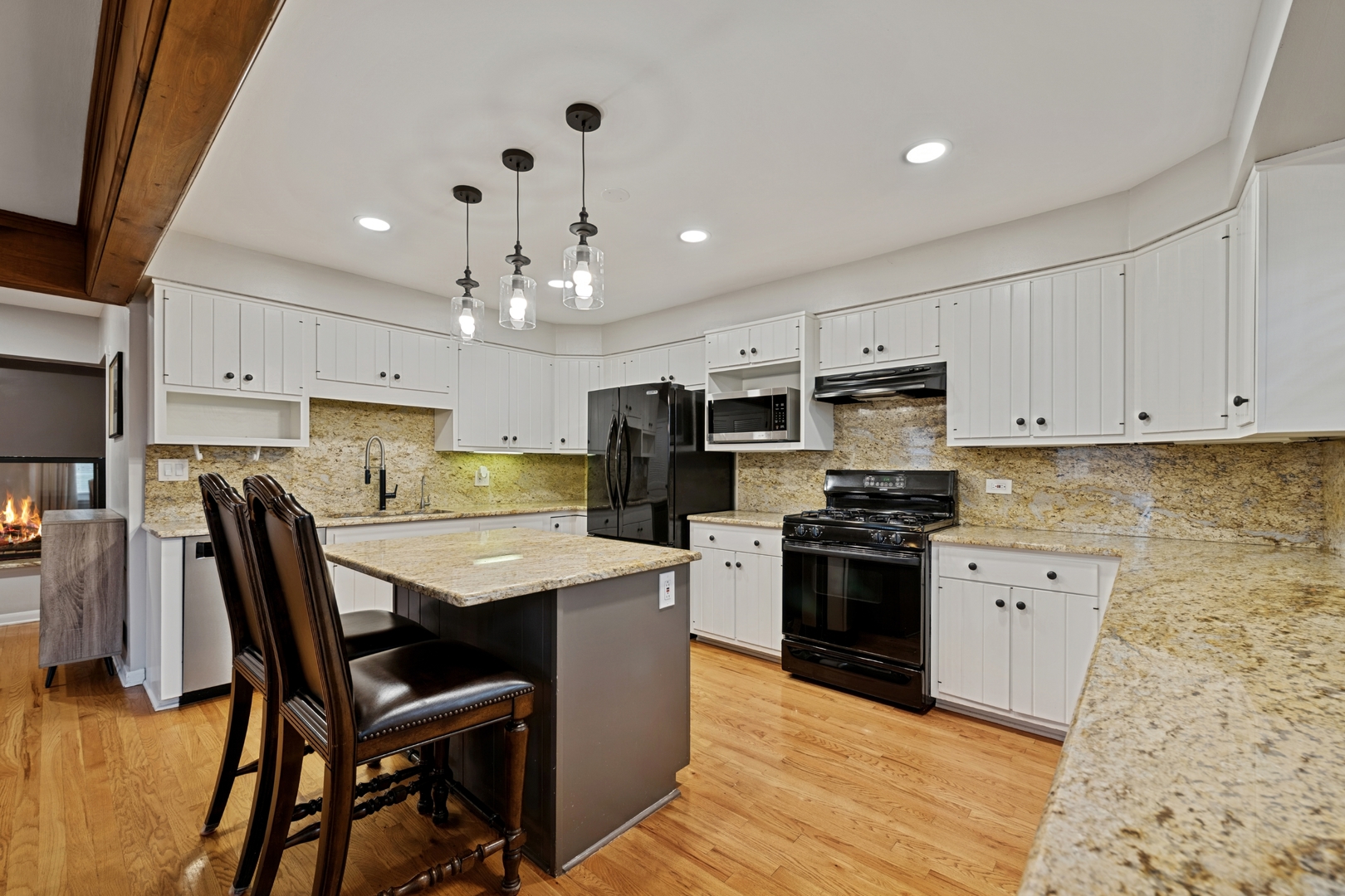 151 Walton Street Barrington, IL 60010 - Photo 10 of 22 a kitchen with a stove a refrigerator and a sink