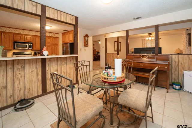 a kitchen with sink cabinets and window