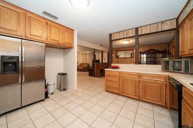 a workspace with furniture and window