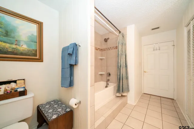 a view of storage and utility room with washer and dryer