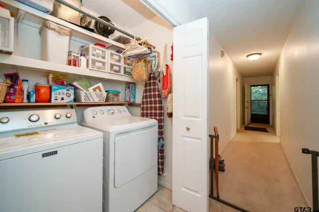 a bedroom with bed and a window