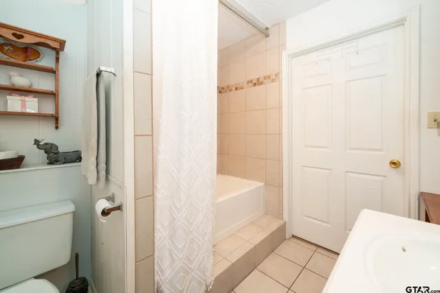 a bathroom with a sink and a bathtub