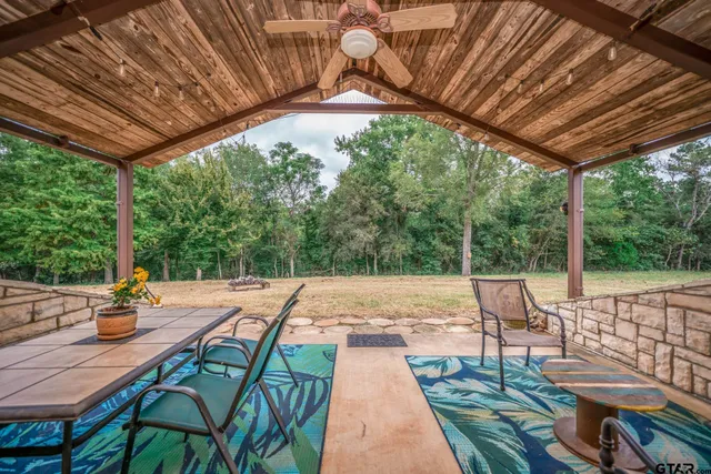 a view of yard with seating space