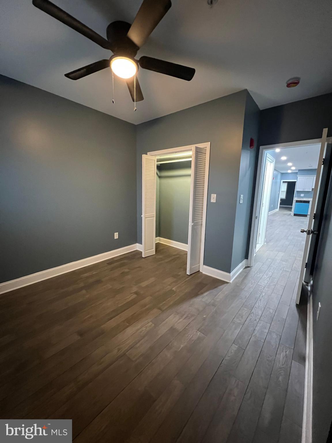 2020 McCulloh Street, Unit 2 Baltimore, MD 21217 - Photo 12 of 12 en empty room with wooden floor and windows