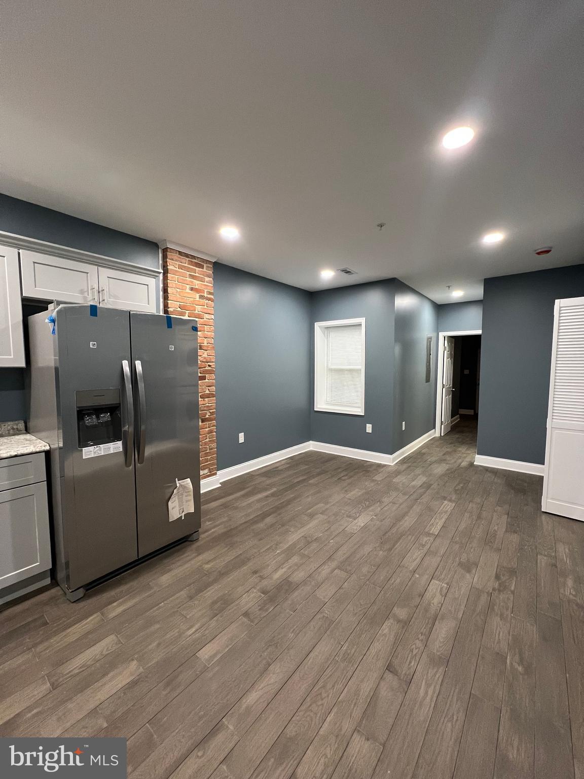 2020 McCulloh Street, Unit 2 Baltimore, MD 21217 - Photo 2 of 12 a view of a kitchen with a sink and a refrigerator