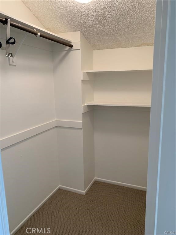 5604 Las Virgenes Road, Unit 76 Calabasas, CA 91302 - Photo 18 of 24 Primary bedroom walk in closet