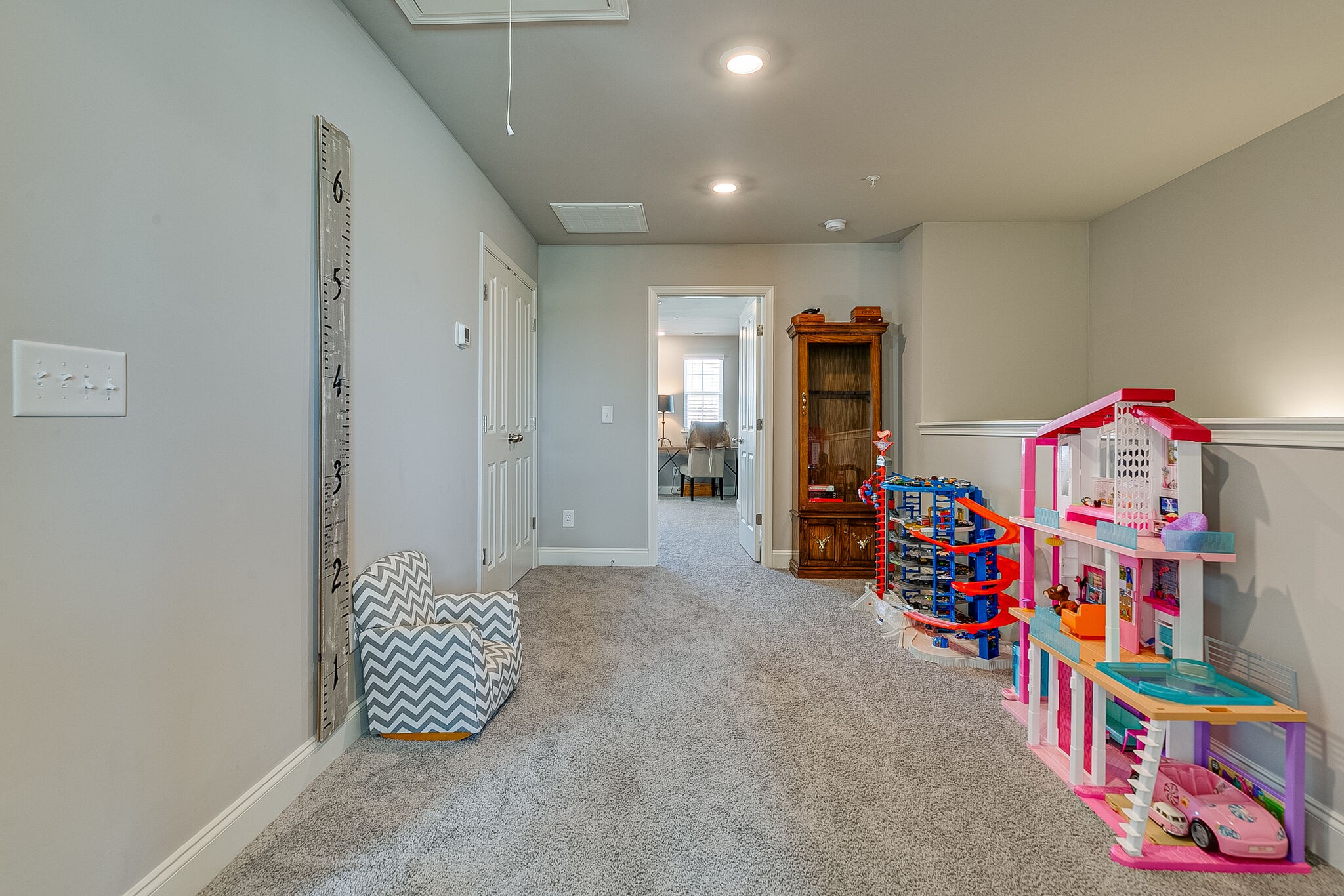 1206 June Wilde Ridge Spring Hill, TN 37174 - Photo 26 of 43 an empty room with toys and a baby crib