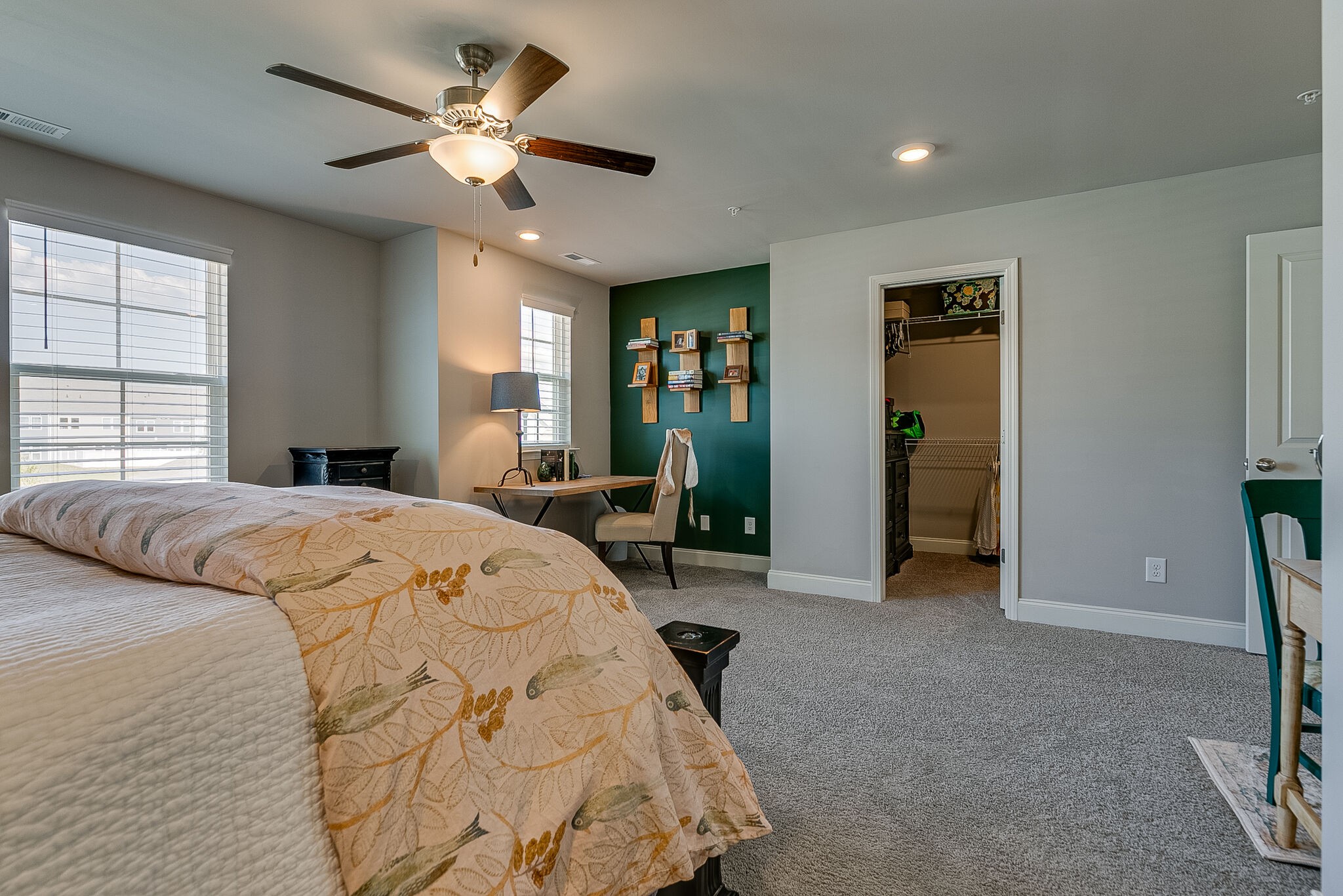 1206 June Wilde Ridge Spring Hill, TN 37174 - Photo 31 of 43 a bedroom with a large bed and a chandelier