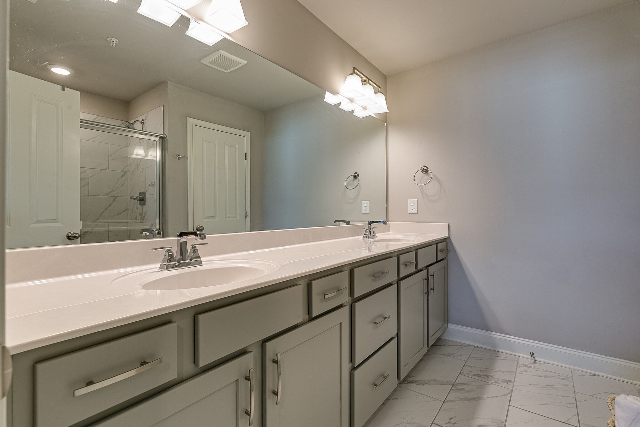 1206 June Wilde Ridge Spring Hill, TN 37174 - Photo 32 of 43 a bathroom with a sink and a mirror