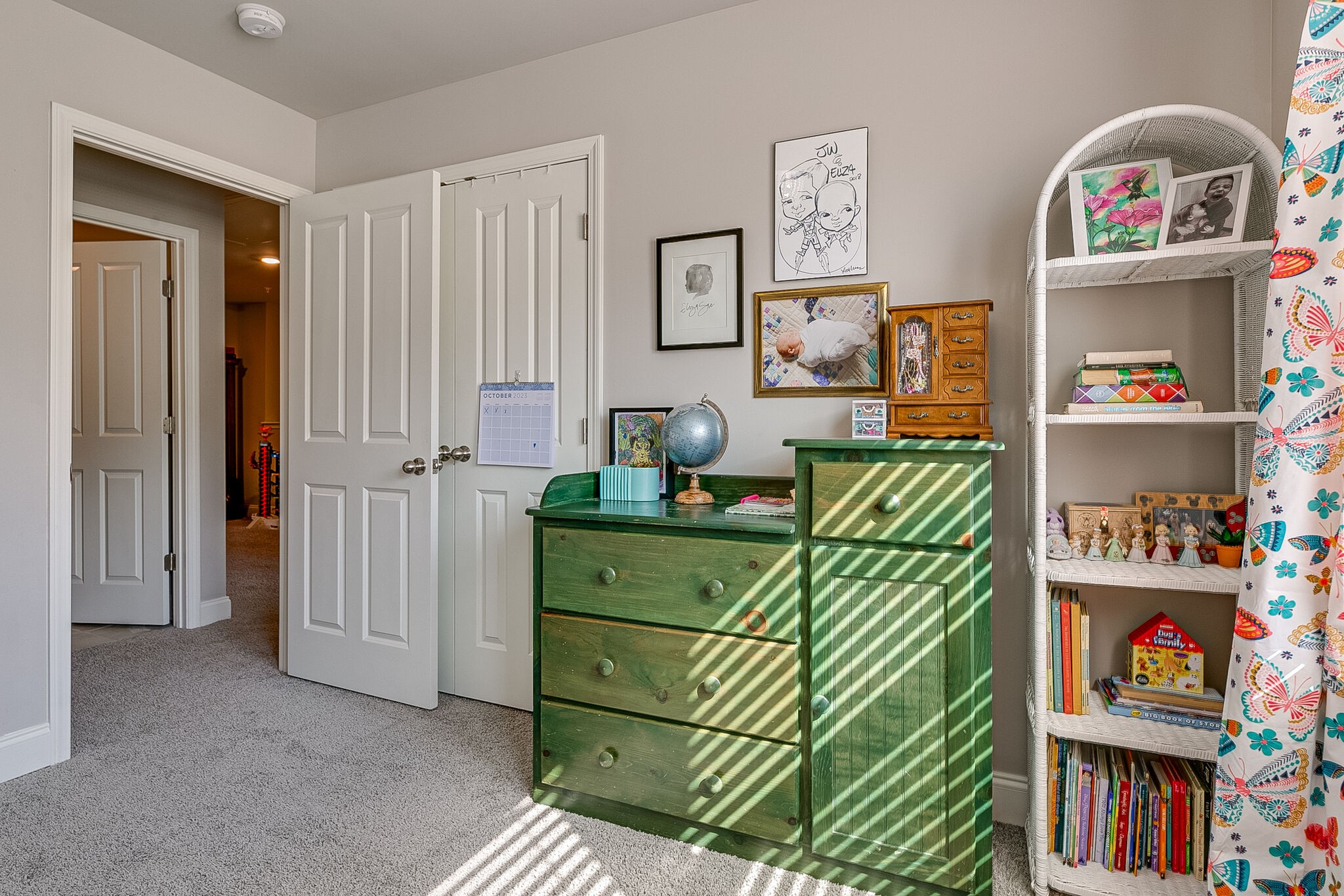 1206 June Wilde Ridge Spring Hill, TN 37174 - Photo 38 of 43 a bedroom with a bed and a book shelf
