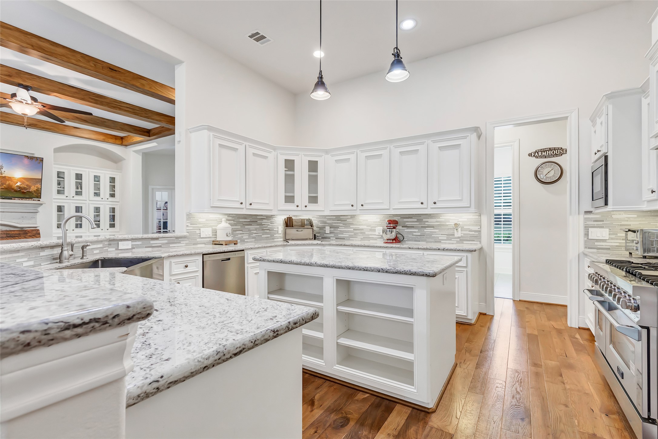 229 Sundog Road Huntsville, TX 77340 - Photo 18 of 50 This is a cook's dream kitchen wth the island work space, stainless appliances and storage!