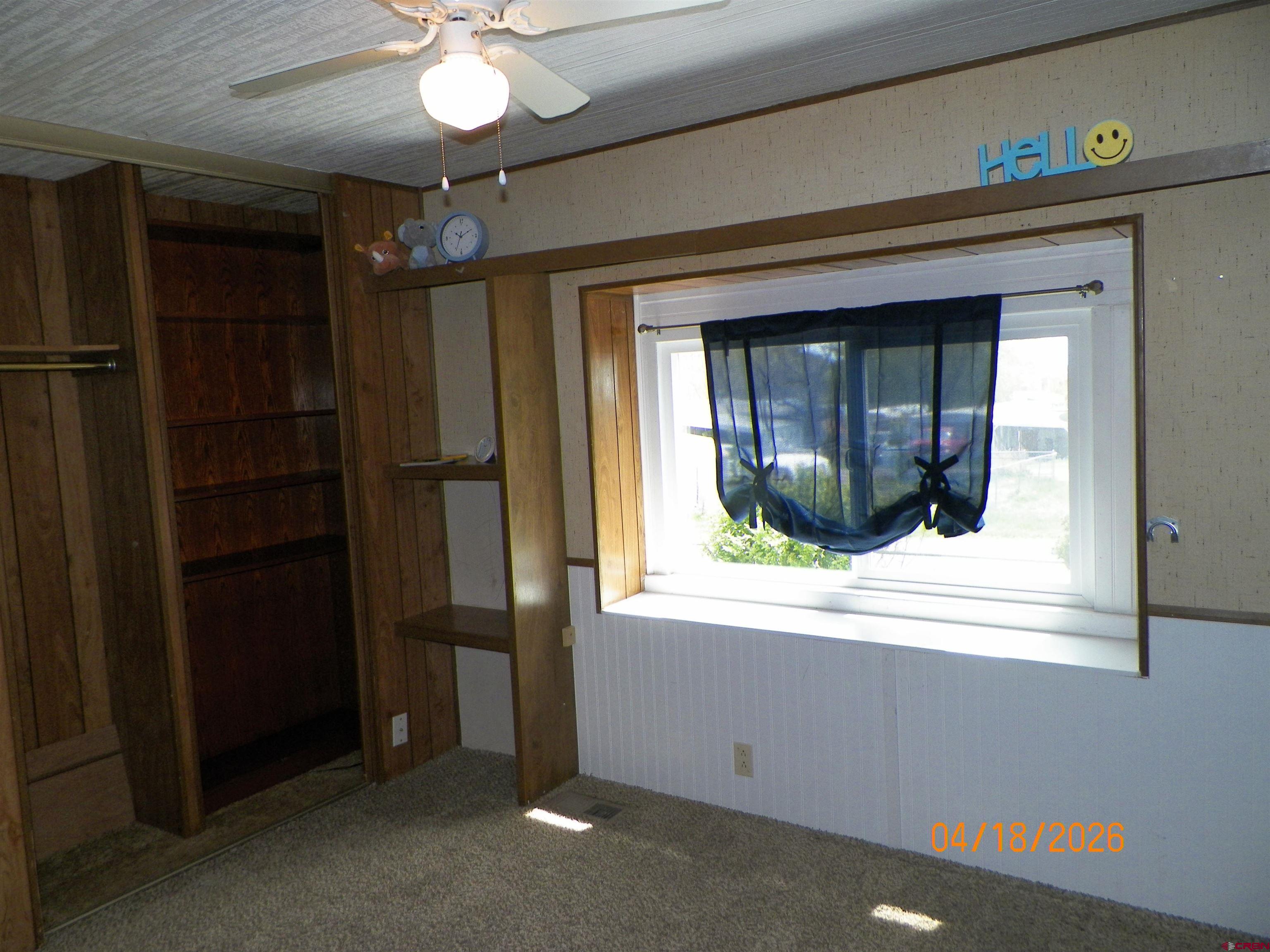 240 Southwest 13th Circle Cedaredge, CO 81413 - Photo 26 of 30 wooden floor and window in an empty room