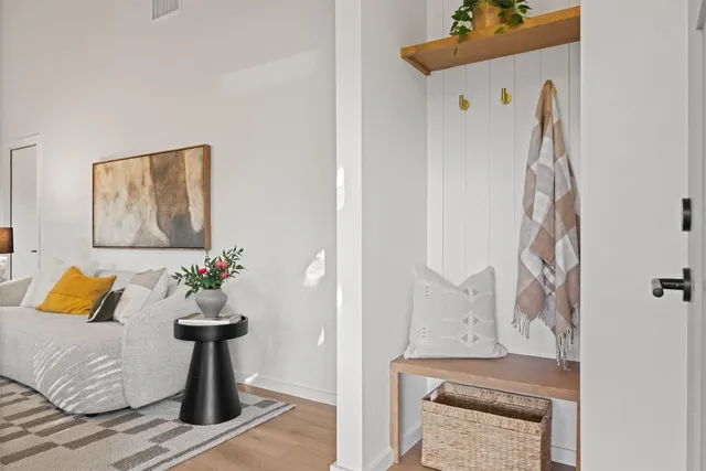 a bathroom with a sink a vanity and a mirror