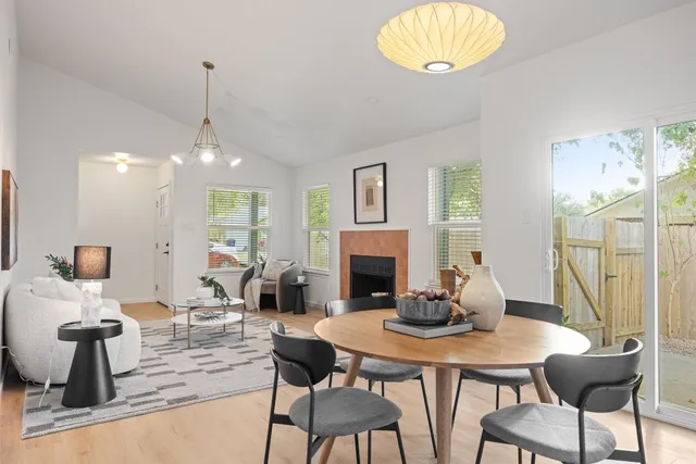 a bedroom with a bed and a potted plant