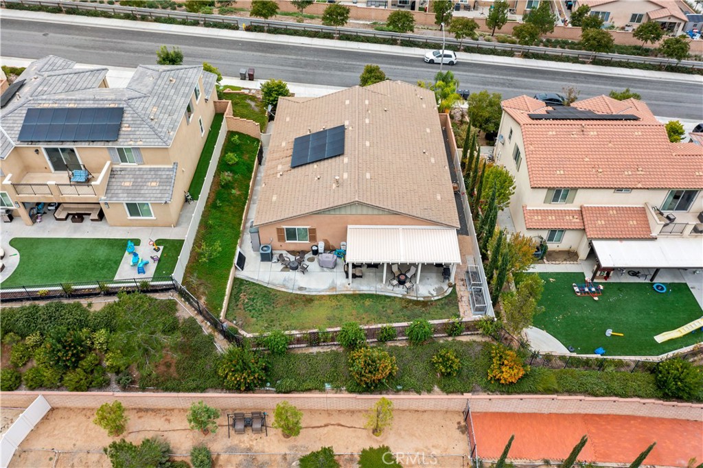 30640 Lone Pine Drive Menifee, CA 92584 - Photo 36 of 48 an aerial view of a house with a yard and lake view