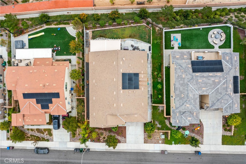 30640 Lone Pine Drive Menifee, CA 92584 - Photo 38 of 48 an aerial view of a house with a backyard space