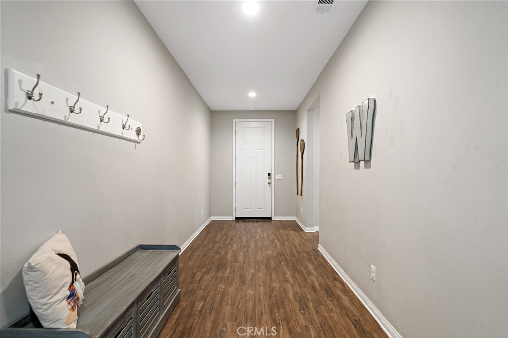 30640 Lone Pine Drive Menifee, CA 92584 - Photo 4 of 48 a view of entryway with wooden floor
