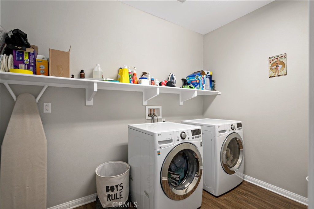 30640 Lone Pine Drive Menifee, CA 92584 - Photo 10 of 48 a utility room with dryer and washer