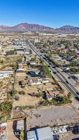an aerial view of residential building and parking space