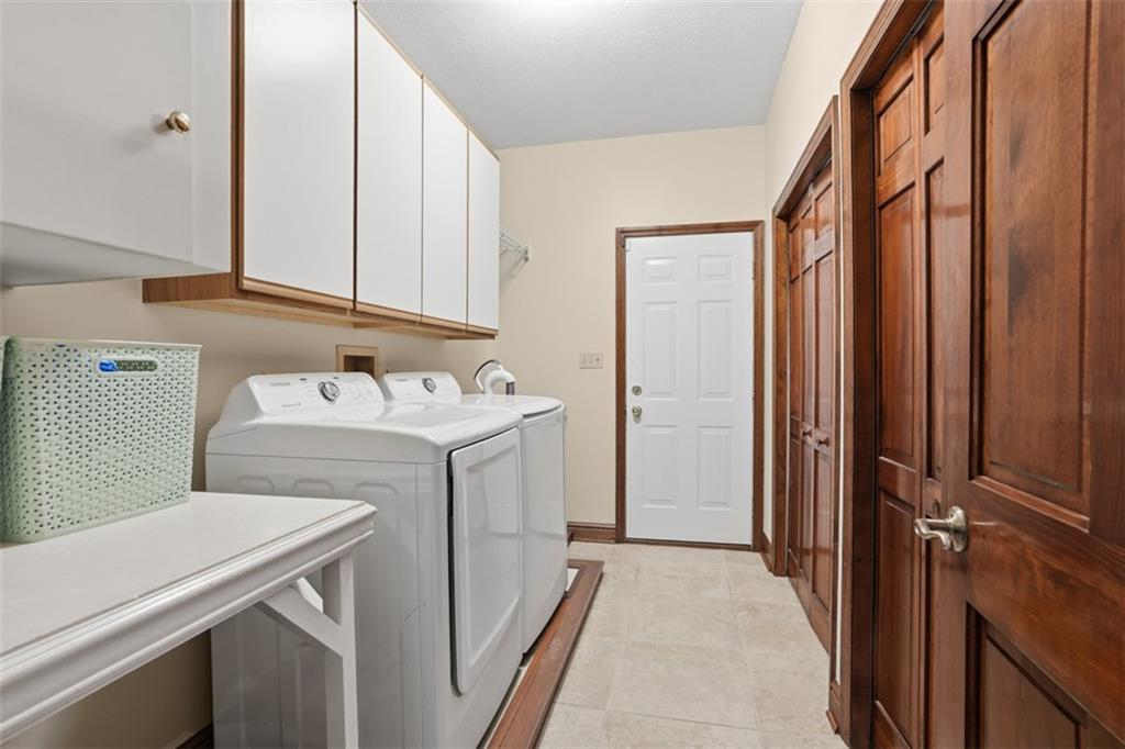 109 Brookside Lane Coraopolis, PA 15108 - Photo 23 of 50 a utility room with dryer and washer