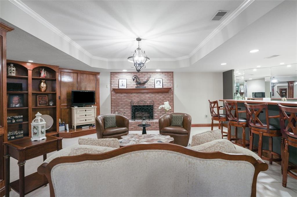 109 Brookside Lane Coraopolis, PA 15108 - Photo 38 of 50 a large bedroom with bed and a fireplace