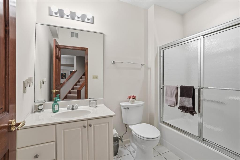 109 Brookside Lane Coraopolis, PA 15108 - Photo 42 of 50 a bathroom with a toilet sink and mirror