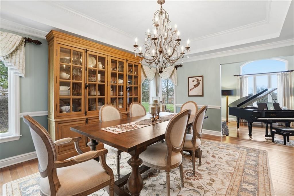109 Brookside Lane Coraopolis, PA 15108 - Photo 7 of 50 a view of a dining room with furniture and chandelier