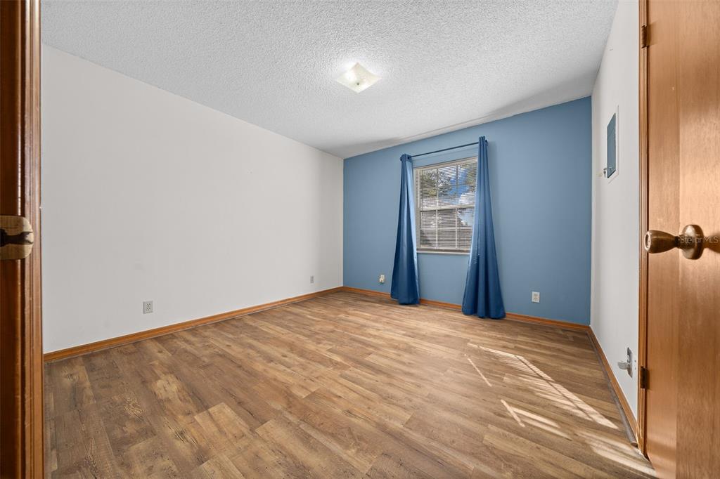 2645 Southeast 162nd Place Road Summerfield, FL 34491 - Photo 16 of 38 a view of an empty room with window