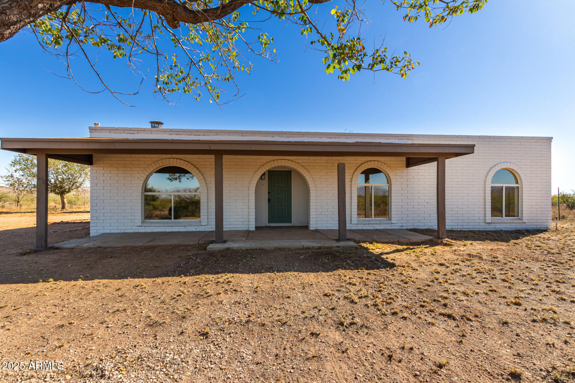 3613 East White Tail Road Pearce, AZ 85625 - Photo 1 of 39 a front view of a house